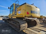 Back corner of used Excavator in yard